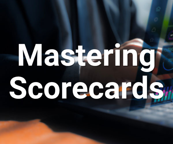 A person at a laptop uses a touch screen with charts, and the words Mastering Scorecards appear in bold white text across the image.