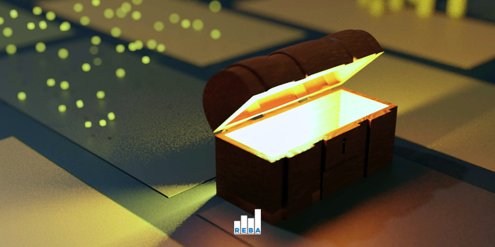 A glowing wooden treasure chest sits open on a surface, emitting bright light. Soft yellow orbs float in the background. Theres a small logo featuring three bars and the word REBA beneath the chest.