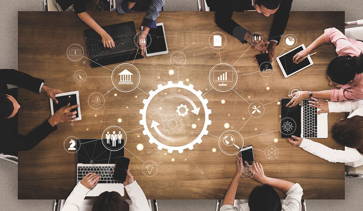 Business team collaborating on digital transformation, data analytics, and workflow management.